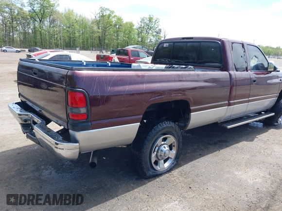2002 Dodge 2500 z VIN 3B7KF23C92M244271, wystawiony jako IAAI lot #42104621 z przebiegiem 179 986 mil mil oraz . Historia ofert i sprzedaży dostępna na DreamBid. Obrazek 4.