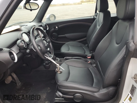 2012 MINI Convertible with VIN WMWZN3C57CT135185, listed as a Copart auction lot 78580644 with 83,027 mi miles and Salvage Title. Bid and sale history available at DreamBid. Image 7.