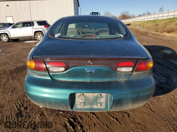 1997 Ford Taurus G with VIN 1FALP51U4VG297298, listed as a Copart auction lot 79660284 with 115,038 mi miles and Clean Title. Bid and sale history available at carsss.com. Image 6.