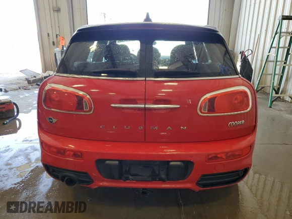 2016 MINI Clubman z VIN WMWLN5C53G2B35247, wystawiony jako Copart lot #56463705 z przebiegiem 107 227 mil mil oraz Nie do naprawy. Historia ofert i sprzedaży dostępna na DreamBid. Obrazek 6.