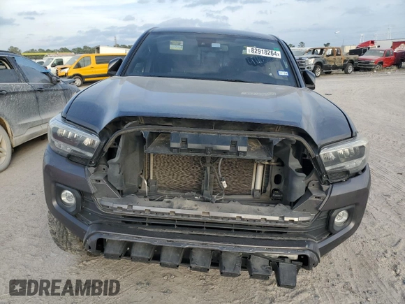 2021 Toyota Tacoma 4WD SR5 with VIN 5TFDZ5BN8MX062787, listed as a Copart auction lot 82918264 with 59,351 mi miles and Salvage Title. Bid and sale history available at carsss.com. Image 5.