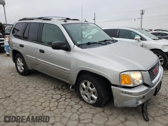 2005 GMC Envoy SLT with VIN 1GKDS13S452258553, listed as a Copart auction lot 82888944 with 174,546 mi miles and Salvage Title. Bid and sale history available at carsss.com. Image 4.