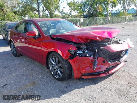 2018 Mazda 6 Grand Touring with VIN JM1GL1TY1J1302146, listed as a IAAI auction lot 41788881 with 55,852 mi miles and . Bid and sale history available at DreamBid. Image 12.