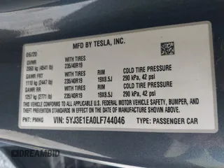 2020 Tesla Model 3 Standard Range Plus with VIN 5YJ3E1EA0LF744046, listed as a IAAI auction lot 41939894 with 102,576 mi miles. Bid and sale history available at carsss.com. Image 9.