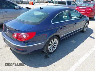 2009 Volkswagen CC Sport with VIN WVWML73C19E554798, listed as a IAAI auction lot 42084459 with 146,809 mi miles. Bid and sale history available at carsss.com. Image 4.