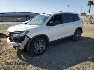 2021 Honda Passport EX-L z VIN 5FNYF7H50MB014143, wystawiony jako Copart lot #52005365 z przebiegiem 85 918 mil mil oraz Szkoda całkowita • Salvage title. Historia ofert i sprzedaży dostępna na DreamBid. Obrazek 1.