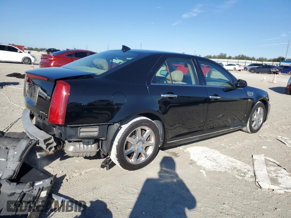2009 Cadillac STS AWD z VIN 1G6DD67V690120833, wystawiony jako Copart lot #42502345 z przebiegiem 100 250 mil mil oraz Szkoda całkowita • Salvage title. Historia ofert i sprzedaży dostępna na DreamBid. Obrazek 3.