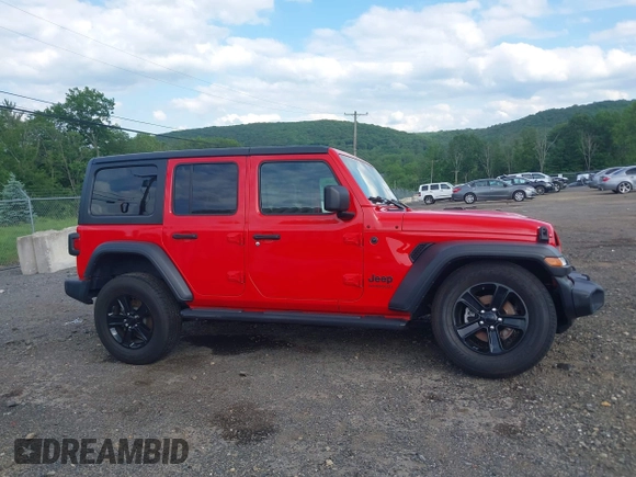 2020 Jeep Wrangler Unlimited Freedom with VIN 1C4HJXDG5LW282721, listed as a IAAI auction lot 42268956 with 47,245 mi miles and . Bid and sale history available at DreamBid. Image 13.