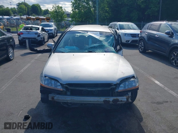 1998 Honda Accord LX z VIN 1HGCG5642WA268665, wystawiony jako IAAI lot #42183420 z przebiegiem 254 417 mil mil oraz . Historia ofert i sprzedaży dostępna na DreamBid. Obrazek 11.