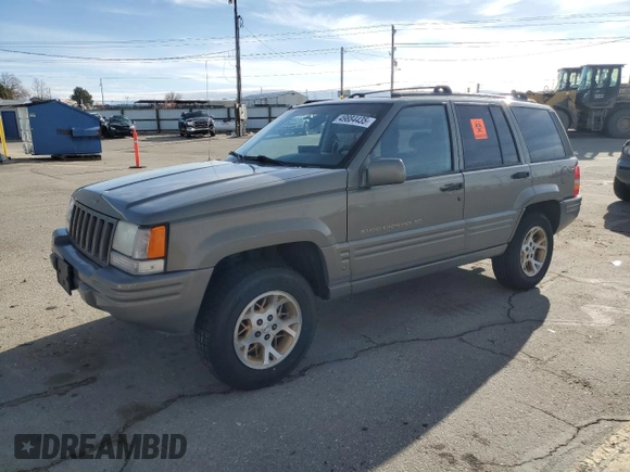 1997 Jeep Grand Cherokee Limited with VIN 1J4GZ78Y4VC754624, listed as a Copart auction lot 49884435 with 144,682 mi miles and Salvage Title. Bid and sale history available at carsss.com. Image 1.
