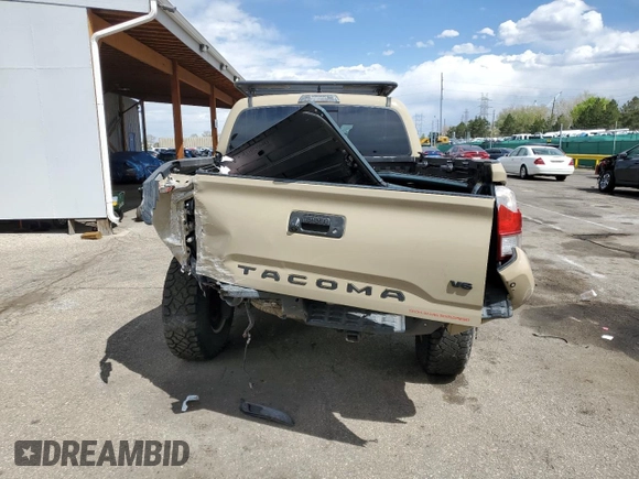 2017 Toyota Tacoma SR5 z VIN 3TMCZ5AN4HM082849, wystawiony jako Copart lot #54246425 z przebiegiem 49 163 mil mil oraz Szkoda całkowita • Salvage title. Historia ofert i sprzedaży dostępna na DreamBid. Obrazek 6.