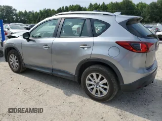 2015 Mazda CX-5 Sport with VIN JM3KE2BE4F0533273, listed as a Copart auction lot 60307795 with 120,484 mi miles and Salvage title. Bid and sale history available at DreamBid. Image 2.