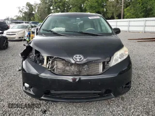 2012 Toyota Sienna XLE AAS with VIN 5TDYK3DC1CS279236, listed as a Copart auction lot 63329165 with 143,937 mi miles and Salvage title. Bid and sale history available at DreamBid. Image 5.