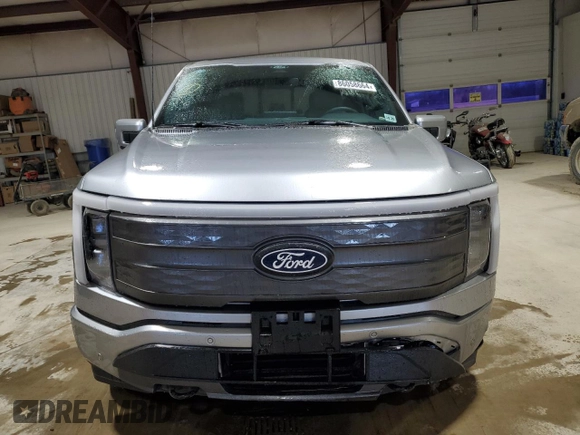 2024 Ford F-150 Lightning Lariat z VIN 1FT6W5L74RWG04451, wystawiony jako Copart lot #86058664 z przebiegiem 2 232 mil mil oraz Szkoda całkowita • Salvage title. Historia ofert i sprzedaży dostępna na DreamBid. Obrazek 5.