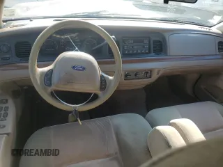2004 Ford Crown Victoria Standard с VIN 2FAFP73W54X135518, выставлен на аукционе Copart как лот 72084114 с пробегом 145 716 миль миль и Списание • Salvage title. История ставок и продаж доступна на DreamBid. Изображение 8.