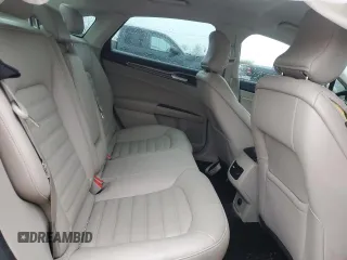 2017 Ford Fusion SE z VIN 3FA6P0H97HR166462, wystawiony jako Copart lot #86265204 z przebiegiem 65 707 mil mil oraz Szkoda całkowita • Salvage title. Historia ofert i sprzedaży dostępna na DreamBid. Obrazek 10.