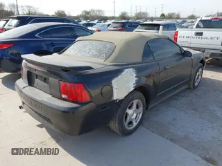 2004 Ford Mustang Deluxe with VIN 1FAFP44624F133914, listed as a IAAI auction lot 41699614 with 170,650 mi miles. Bid and sale history available at carsss.com. Image 4.