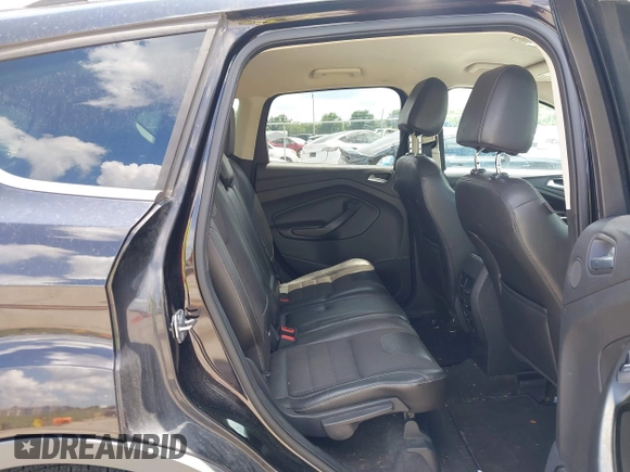 2013 Ford Escape Titanium with VIN 1FMCU9J90DUA01551, listed as a IAAI auction lot 42686247 with 190,707 mi miles and . Bid and sale history available at DreamBid. Image 8.
