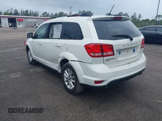 2017 Dodge Journey SXT with VIN 3C4PDDBG3HT592061, listed as a IAAI auction lot 38299155 with 127,856 mi miles and . Bid and sale history available at DreamBid. Image 3.