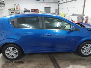 2016 Chevrolet Sonic LT with VIN 1G1JC6SH2G4168106, listed as a IAAI auction lot 41808797 with 141,473 mi miles. Bid and sale history available at carsss.com. Image 14.
