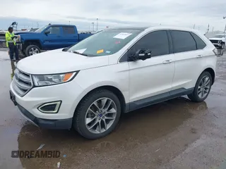 2015 Ford Edge Titanium z VIN 2FMTK3K82FBC42299, wystawiony jako IAAI lot #41912657 z przebiegiem 198 144 mil mil oraz . Historia ofert i sprzedaży dostępna na DreamBid. Obrazek 17.