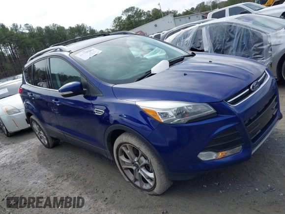 2016 Ford Escape Titanium with VIN 1FMCU9JXXGUA71898, listed as a IAAI auction lot 41758284 with 51,935 mi miles. Bid and sale history available at carsss.com. Image 13.