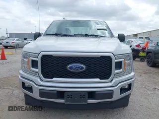 2018 Ford F-150 XL with VIN 1FTEW1CP9JKC79991, listed as a IAAI auction lot 41737265 with 123,655 mi miles and . Bid and sale history available at DreamBid. Image 12.