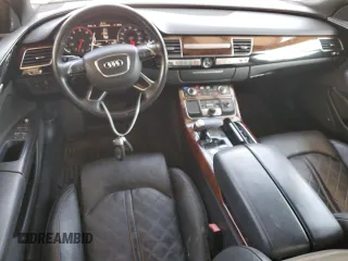 2013 Audi A8 4.0L z VIN WAUR2AFD5DN009591, wystawiony jako Copart lot #63635535 z przebiegiem 159 321 mil mil oraz Czysty tytuł • Clean title. Historia ofert i sprzedaży dostępna na DreamBid. Obrazek 8.
