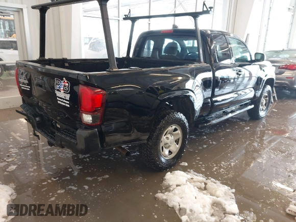 2023 Toyota Tacoma SR with VIN 3TYRX5GN2PT069110, listed as a IAAI auction lot 41235858 with 60,019 mi miles and . Bid and sale history available at DreamBid. Image 4.