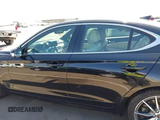 2023 Genesis G70 2.0T with VIN KMTG34TA3PU132398, listed as a IAAI auction lot 42497066 with 34,759 mi miles and . Bid and sale history available at DreamBid. Image 14.