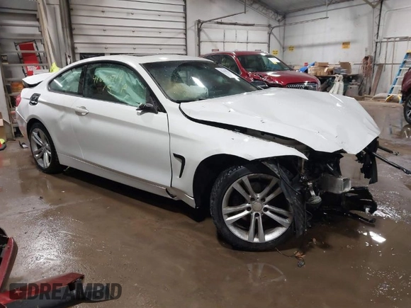 2015 BMW 4 Series 428i xDrive z VIN WBA3N9C52FK246245, wystawiony jako IAAI lot #41650714 z przebiegiem 142 776 mil mil oraz . Historia ofert i sprzedaży dostępna na DreamBid. Obrazek 1.