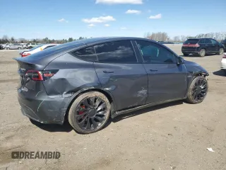 2023 Tesla Model Y Performance with VIN 7SAYGDEF3PF946496, listed as a Copart auction lot 50800315 with 15,077 mi miles and Salvage Title. Bid and sale history available at DreamBid. Image 3.
