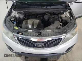 2011 Kia Sorento LX with VIN 5XYKT4A2XBG047542, listed as a Copart auction lot 50230175 with 176,881 mi miles and Salvage Title. Bid and sale history available at DreamBid. Image 12.