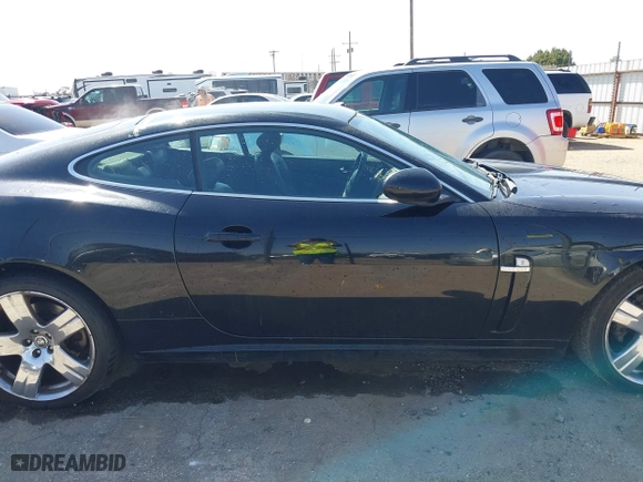 2009 Jaguar XK with VIN SAJWA43B295B31026, listed as a IAAI auction lot 41950751 with 110,331 mi miles. Bid and sale history available at carsss.com. Image 13.