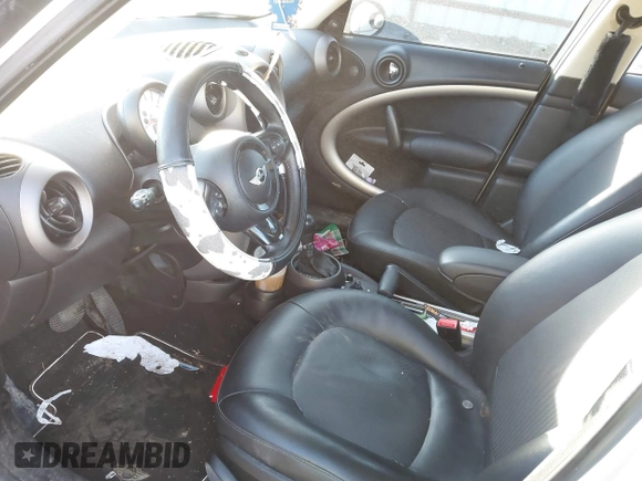 2012 MINI Countryman with VIN WMWZB3C55CWM03612, listed as a IAAI auction lot 41445142 with 217,495 mi miles and . Bid and sale history available at DreamBid. Image 5.