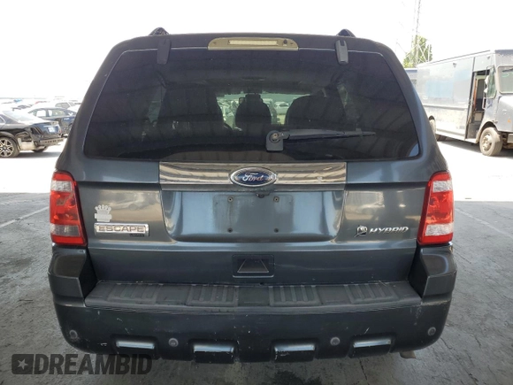 2010 Ford Escape Hybrid z VIN 1FMCU5K30AKA77460, wystawiony jako Copart lot #56363305 z przebiegiem 294 973 mil mil oraz Czysty tytuł • Clean title. Historia ofert i sprzedaży dostępna na DreamBid. Obrazek 6.