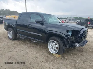 2018 Toyota Tacoma SR with VIN 5TFAX5GN3JX114646, listed as a IAAI auction lot 42158450 with 98,192 mi miles and . Bid and sale history available at DreamBid. Image 1.