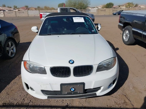 2013 BMW 1 Series 128i with VIN WBAUN1C55DVR01404, listed as a IAAI auction lot 41682695 with 100,948 mi miles. Bid and sale history available at carsss.com. Image 12.
