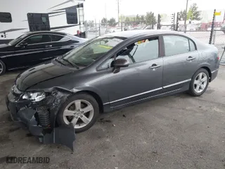 2010 Honda Civic Sdn LX-S with VIN 19XFA1F63AE065877, listed as a IAAI auction lot 41884982 with 195,939 mi miles. Bid and sale history available at carsss.com. Image 2.