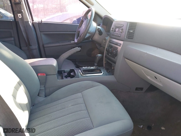 2006 Jeep Grand Cherokee Laredo with VIN 1J8GS48K86C348389, listed as a IAAI auction lot 41187321 with 166,275 mi miles. Bid and sale history available at carsss.com. Image 5.