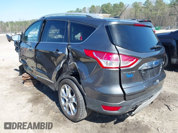 2015 Ford Escape Titanium with VIN 1FMCU0J90FUC10514, listed as a IAAI auction lot 41785756 with 222,434 mi miles and . Bid and sale history available at DreamBid. Image 3.