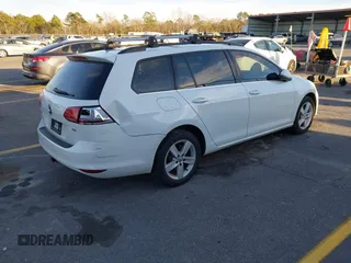 2015 Volkswagen Golf SportWagen TDI S with VIN 3VWCA7AU1FM517685, listed as a IAAI auction lot 41321742 with 142,348 mi miles. Bid and sale history available at carsss.com. Image 4.