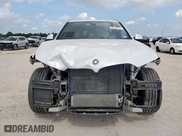 2021 BMW X5 sDrive40i with VIN 5UXCR4C06M9F56578, listed as a Copart auction lot 58218315 with 69,927 mi miles and Salvage title. Bid and sale history available at DreamBid. Image 5.