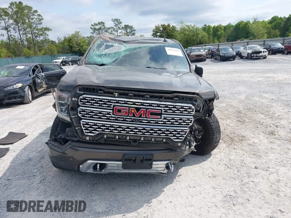 2019 GMC Sierra 1500 Denali z VIN 1GTU9FEL8KZ180128, wystawiony jako IAAI lot #42028488 z przebiegiem 78 015 mil mil oraz . Historia ofert i sprzedaży dostępna na DreamBid. Obrazek 12.