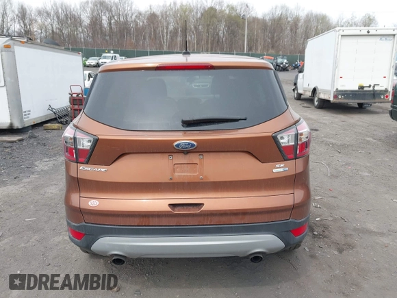 2017 Ford Escape SE with VIN 1FMCU9GD5HUA57132, listed as a IAAI auction lot 42075470 with 106,271 mi miles. Bid and sale history available at carsss.com. Image 16.