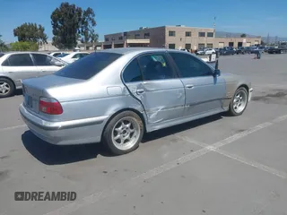 1997 BMW 5 Series 540i z VIN WBADE5326VBV91232, wystawiony jako IAAI lot #42235018 z przebiegiem 148 305 mil mil oraz . Historia ofert i sprzedaży dostępna na DreamBid. Obrazek 4.