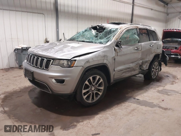 2018 Jeep Grand Cherokee Limited z VIN 1C4RJFBG1JC204615, wystawiony jako IAAI lot #42389992 z przebiegiem 98 335 mil mil oraz . Historia ofert i sprzedaży dostępna na DreamBid. Obrazek 2.