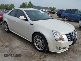2013 Cadillac CTS Premium z VIN 1G6DS5E36D0160341, wystawiony jako IAAI lot #42341029 z przebiegiem 56 918 mil mil oraz . Historia ofert i sprzedaży dostępna na DreamBid. Obrazek 1.