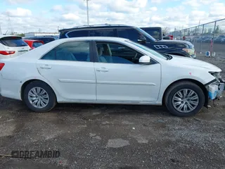 2014 Toyota Camry L with VIN 4T4BF1FK1ER424875, listed as a IAAI auction lot 42025877 with 113,919 mi miles. Bid and sale history available at carsss.com. Image 13.