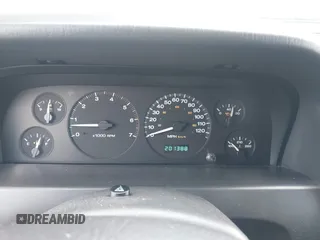 1999 Jeep Grand Cherokee Limited z VIN 1J4GW68N3XC597468, wystawiony jako IAAI lot #42353732 z przebiegiem 201 388 mil mil oraz . Historia ofert i sprzedaży dostępna na DreamBid. Obrazek 7.